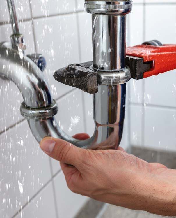 plumber checking drain
